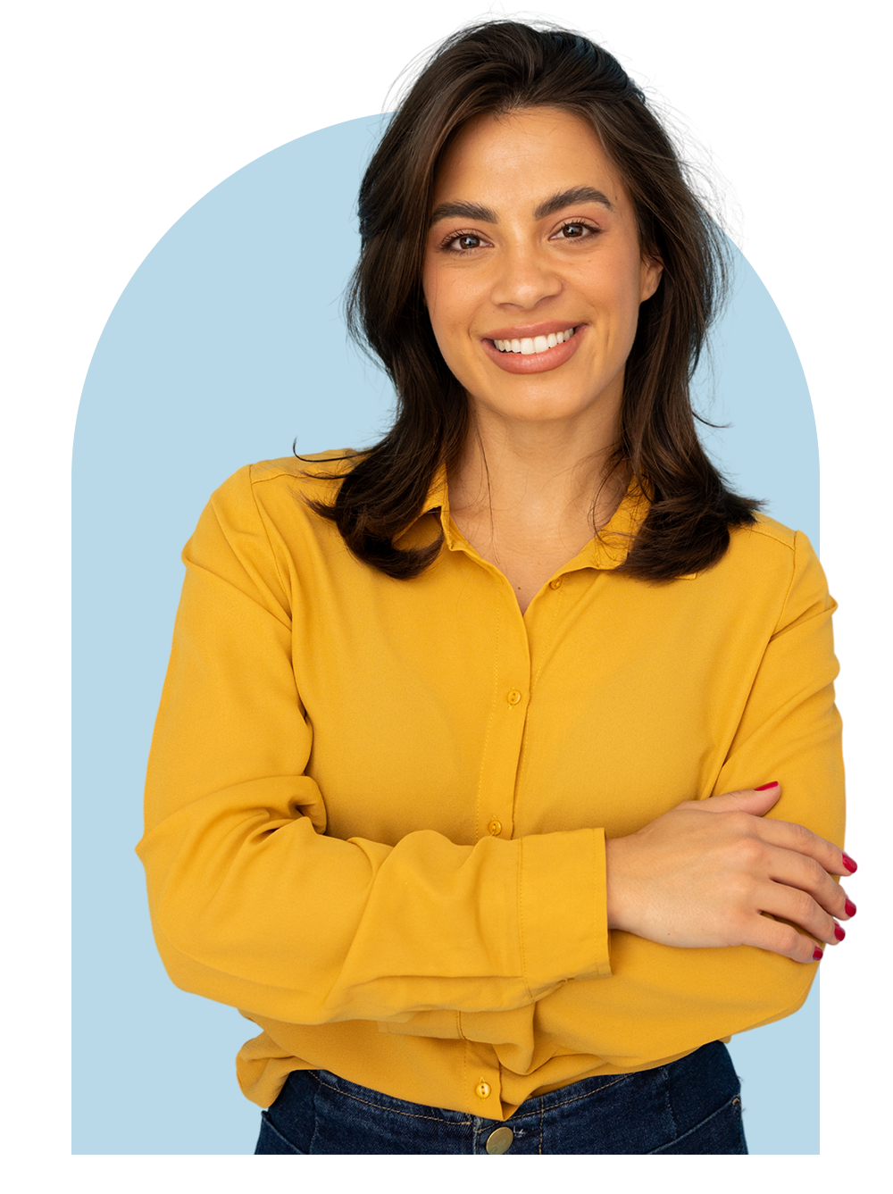 Smiling woman in a yellow shirt standing in front of a light blue arch