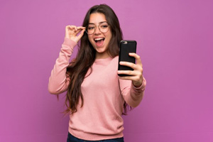 Confident young woman taking a selfie