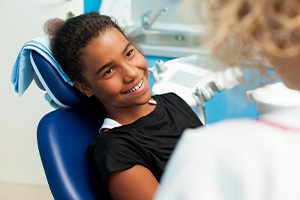 Little girl smiling during dental checkup