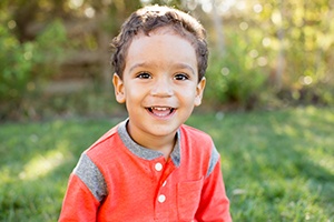 Smiling young boy with dental sealants