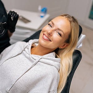 Happy dental patient viewed from above