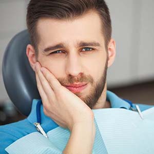 Pained man should visit his East Hartford emergency dentist