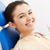 Woman smiling after gum grafting