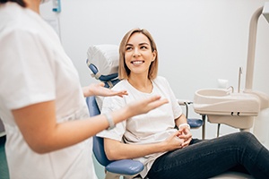 Patient and dentist discussing treatment