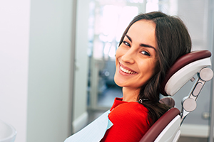 Smiling woman in dental chair