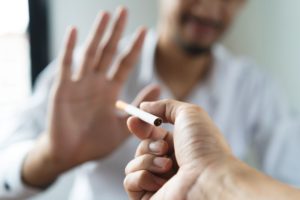 Man saying no to offer of a cigarette